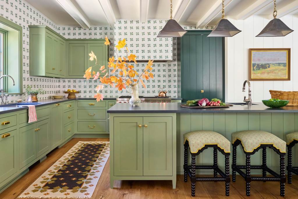 Rustic farmhouse kitchen with restored milk paint cabinets in Patina Green