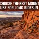 Mountain bike leaning against red rocks in Utah with article title text overlay.