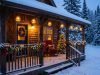 Glowing solar Christmas lanterns hanging on a snowy Canadian porch at night.
